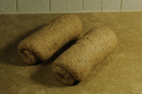 Loaves resting on counter